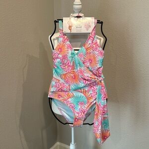NWT ladies one piece swimsuit, SZ S, adjustable strap, wrap around design